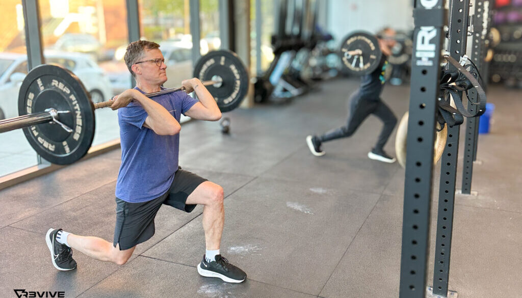 A member performing forward lunges